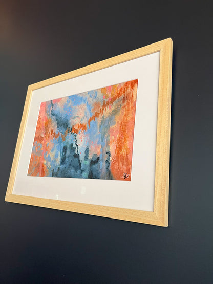 Framed Watercolour Abstract called Conundrum hanged on a dark blue wall